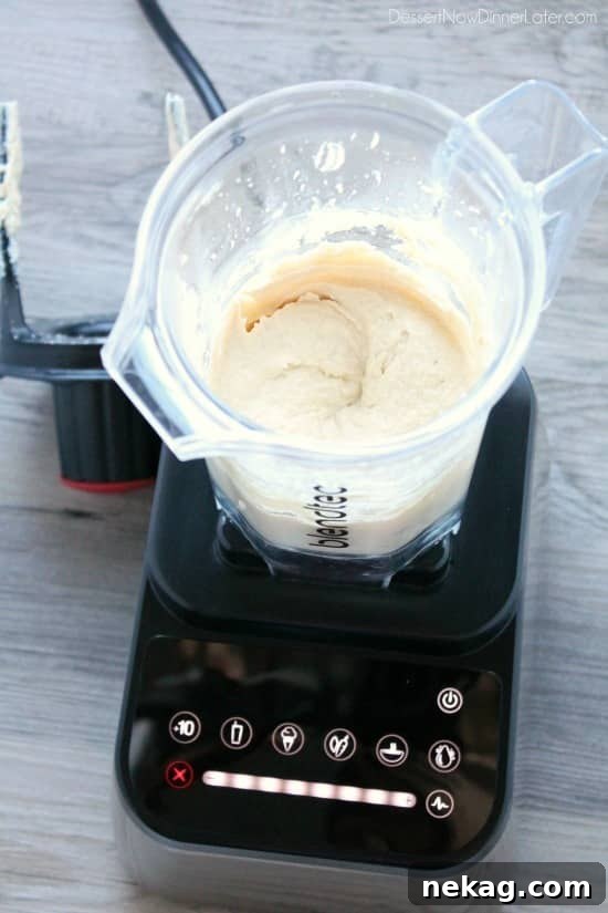 This low carb cauliflower hummus is smooth, creamy, and full of savory garlic flavor!