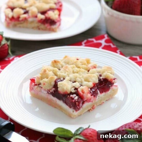 Strawberries and Cream Crumb Bars | More Strawberries & Cream Desserts 7 These strawberries and cream crumb bars are sweet and creamy with a buttery crumb crust and topping.