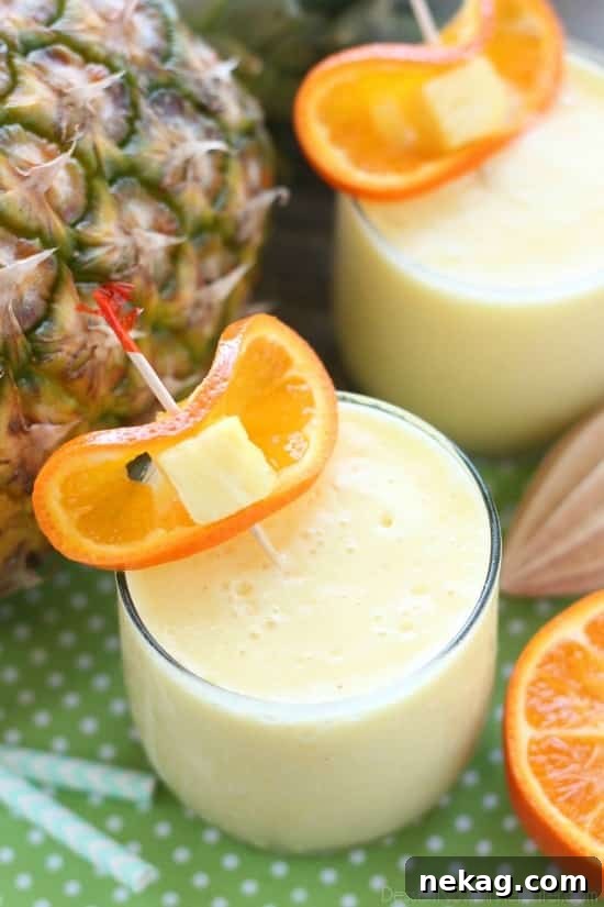 Just add ice to this frothy, sweet, and creamy 4-ingredient summer slush, also called Pineapple Orange Smoothie.