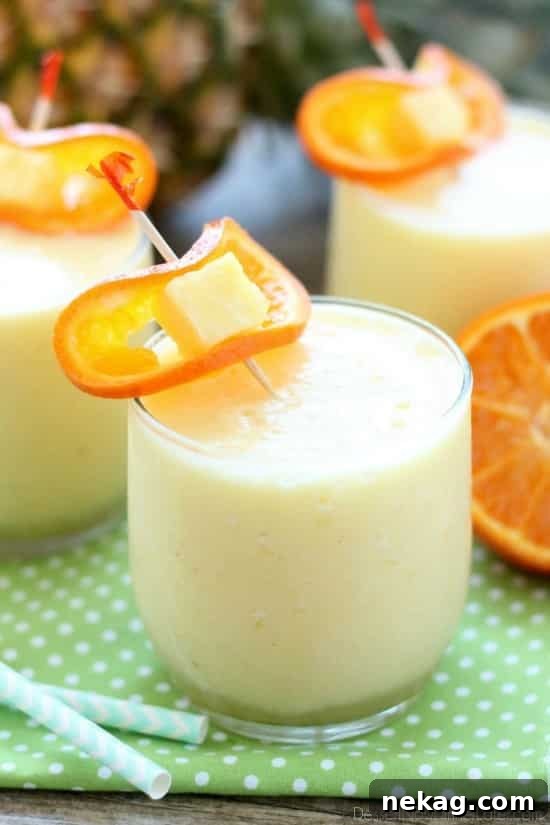 Just add ice to this frothy, sweet, and creamy 4-ingredient summer slush, also called Pineapple Orange Smoothie.