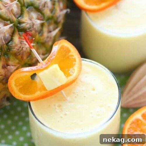 Just add ice to this frothy, sweet, and creamy 4-ingredient summer slush, also called Pineapple Orange Smoothie.