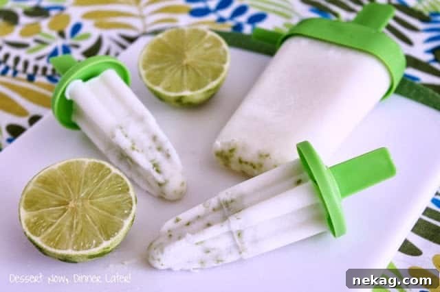 Coconut Key Lime Popsicle Recipe: Creamy Tropical Frozen Treat 4 Popsicles on a tray