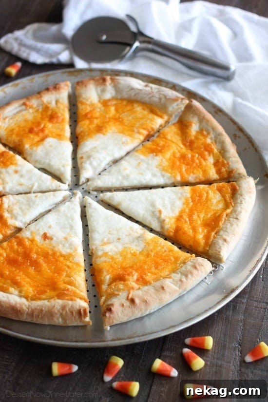 Candy Corn Pizza is a fun and easy idea for Halloween dinner -- even the kids can make it!