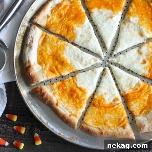 Candy Corn Pizza is a fun and easy idea for Halloween dinner -- even the kids can make it!