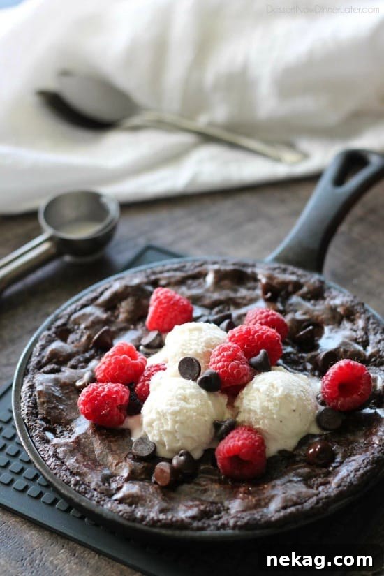 Skillet Brownie Recipe: Gooey Chocolate Brownie for Sharing 2 This fudgy skillet brownie is made with a boxed mix for a quick dessert for two! Eat it warm from the oven topped with ice cream, chocolate chips, and fresh raspberries for an extra special treat!