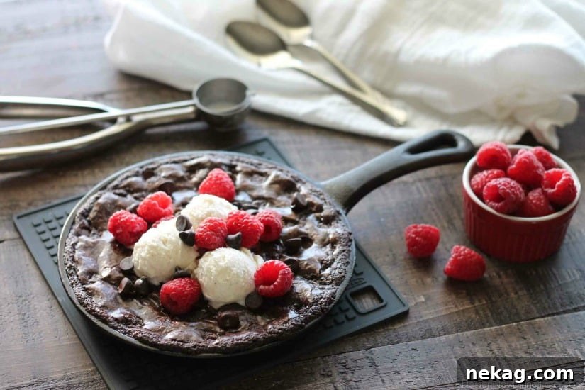 Skillet Brownie Recipe: Gooey Chocolate Brownie for Sharing 3 This fudgy skillet brownie is made with a boxed mix for a quick dessert for two! Eat it warm from the oven topped with ice cream, chocolate chips, and fresh raspberries for an extra special treat!