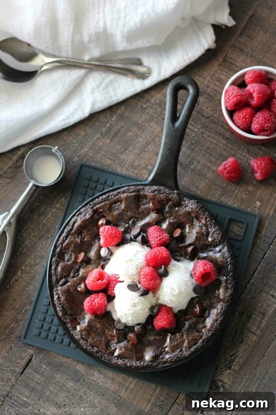 Skillet Brownie Recipe: Gooey Chocolate Brownie for Sharing 7 This fudgy skillet brownie is made with a boxed mix for a quick dessert for two! Eat it warm from the oven topped with ice cream, chocolate chips, and fresh raspberries for an extra special treat!
