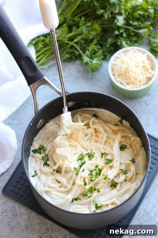 This Garlic Parmesan Spaghetti has browned butter and garlic in its thick and creamy parmesan sauce, for a super flavorful pasta dinner that will have you licking the plate clean.