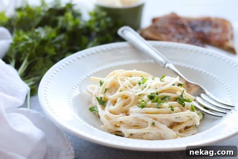 This Garlic Parmesan Spaghetti has browned butter and garlic in its thick and creamy parmesan sauce, for a super flavorful pasta dinner that will have you licking the plate clean.