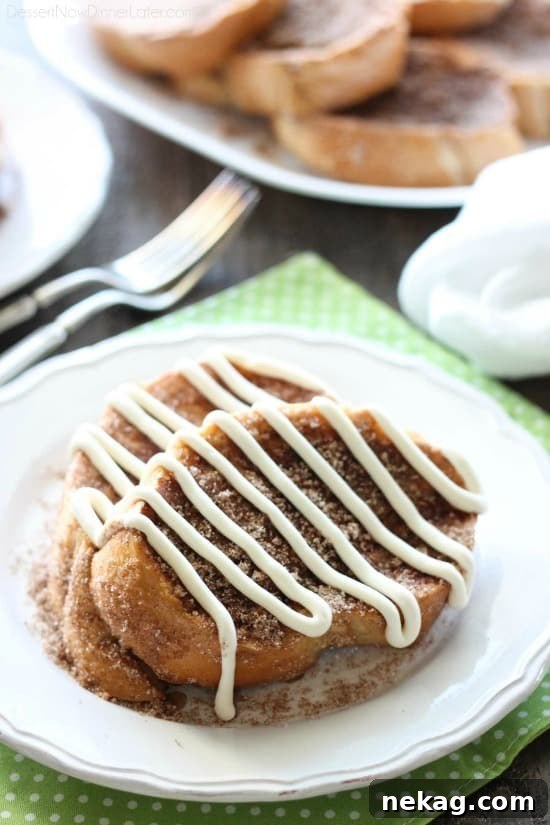 Churro French Toast - Thick slices of French bread are battered and pan fried, then dipped in cinnamon-sugar, and topped with a buttery cream cheese frosting. Delicious!
