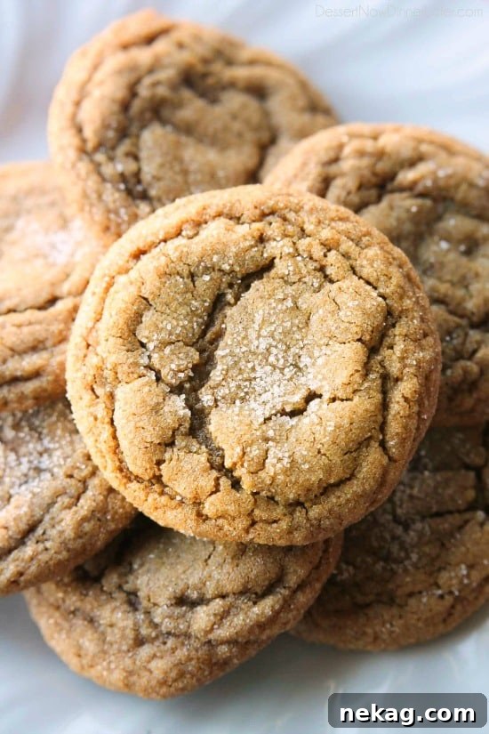 These Soft Baked Gingersnap Cookies are thick and chewy, and full of rich molasses, ginger, and spices for a wonderful Christmas cookie everyone will love!