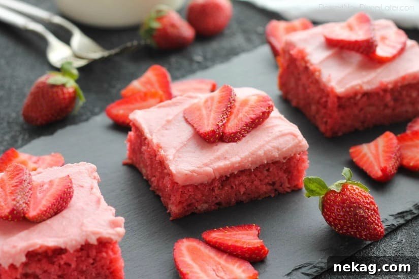 This strawberry cake uses fresh strawberries and flavored gelatin for a super flavorful strawberry sheet cake that will feed a crowd. It's really easy, and incredibly moist too!