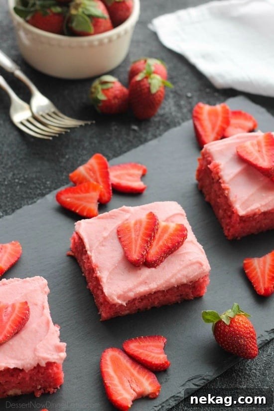 This strawberry cake uses fresh strawberries and flavored gelatin for a super flavorful strawberry sheet cake that will feed a crowd. It's really easy, and incredibly moist too!