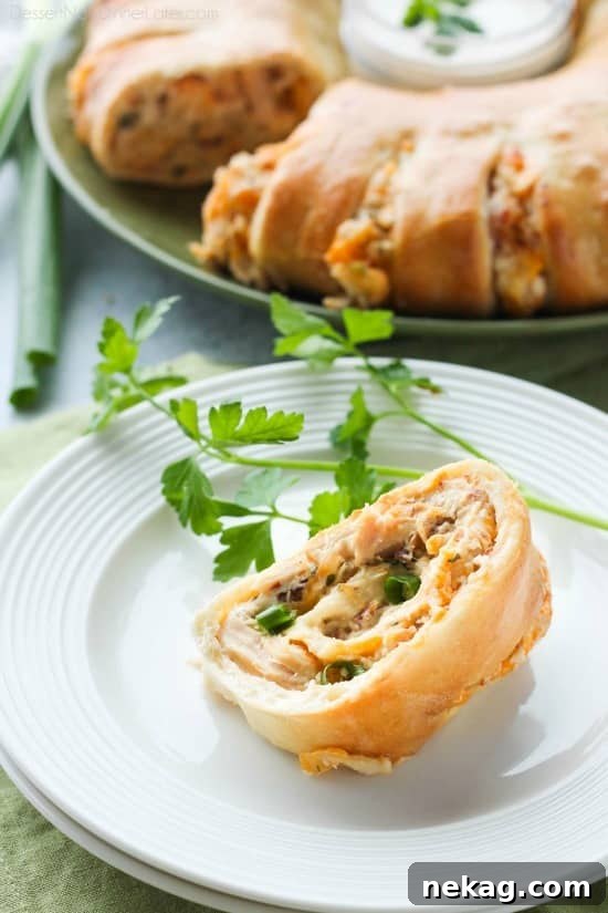 This Bacon Chicken Ranch Sandwich Ring makes a great dinner or party appetizer! It's meaty, cheesy, and full of flavor!