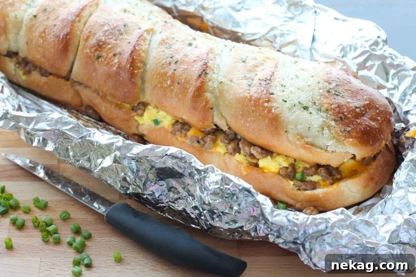 Breakfast-Stuffed French Bread: Savory Morning Sandwich Recipe 6 Sliced loaf with eggs and cheese