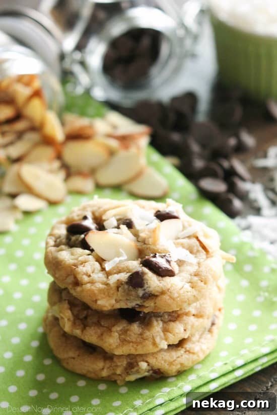 Almond Coconut Chocolate Chip Cookie Recipe for Chewy Treats 4 Almond Coconut Chocolate Chip Cookies are loaded with sliced almonds, shredded coconut, chocolate chips and flavored extracts for an Almond Joy inspired twist on the traditional chocolate chip cookie.