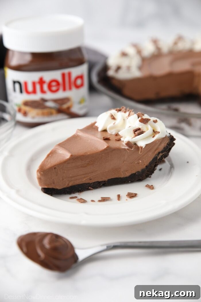 Slice of no bake Nutella cheesecake on a plate.
