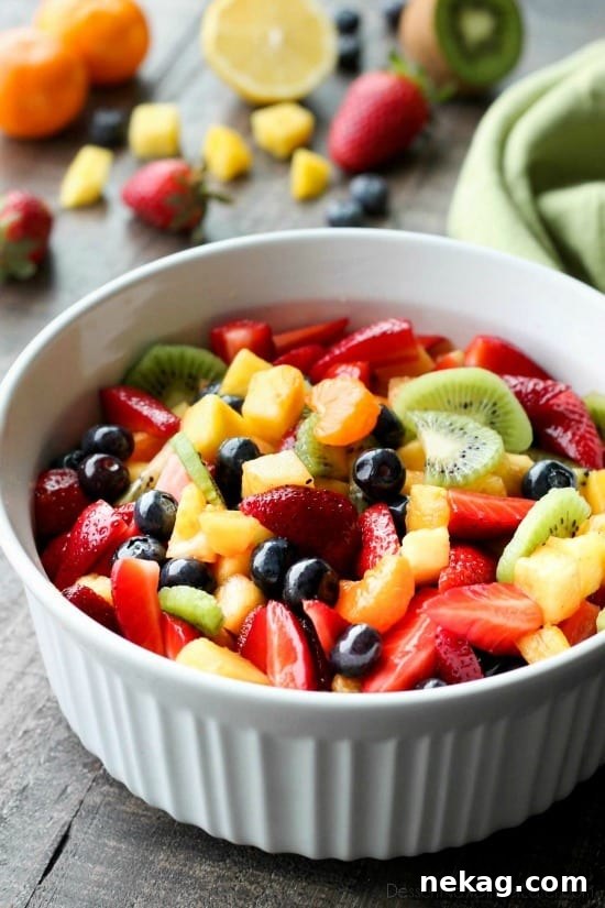 This summer fruit salad is as colorful as a rainbow, and is tossed in a reduced honey orange glaze for the perfect amount of added sweetness and flavor. Great for barbecues, potlucks, and picnics!