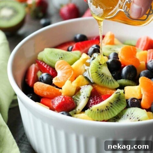 This summer fruit salad is as colorful as a rainbow, and is tossed in a reduced honey orange glaze for the perfect amount of added sweetness and flavor. Great for barbecues, potlucks, and picnics!