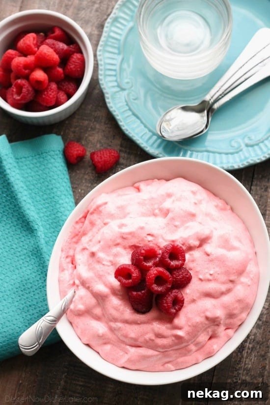 Creamy Raspberry Fluff Fruit Salad Recipe 4 Raspberry Fluff Fruit Salad is the jello salad that everyone loves! With only 4-ingredients and 5 minutes prep, this is the perfect sweet side dish for your next potluck, picnic, or BBQ!