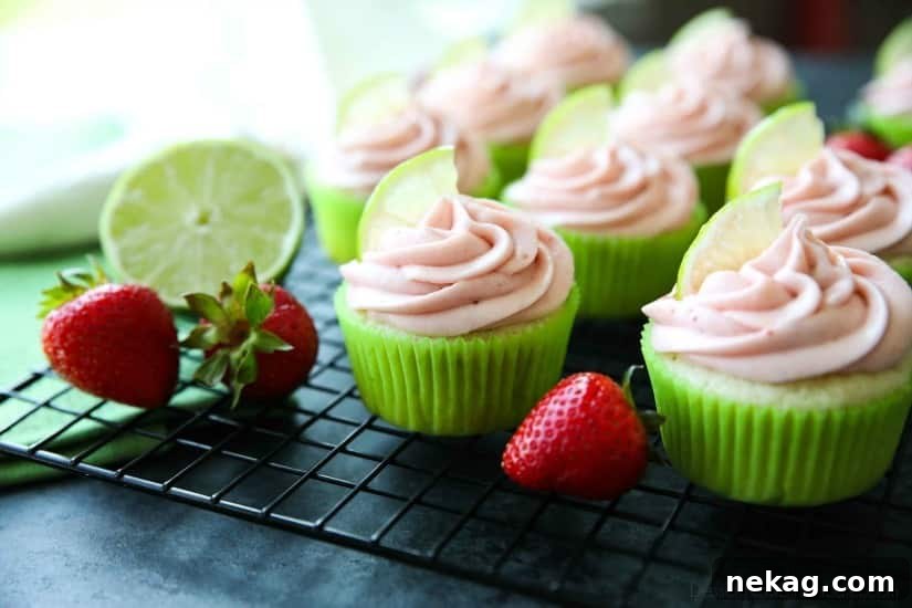 Strawberry Lime Cupcakes are perfect for summer, with a tangy lime cupcake base and sweet strawberry frosting they are sure to be loved by all. A family-friendly, non-alcoholic alternative to strawberry margarita cupcakes!