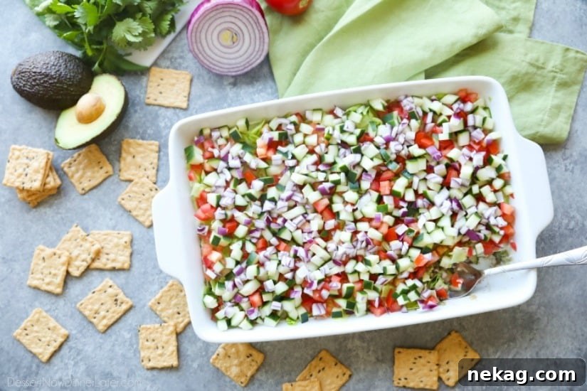 Lightened Seven-Layer Dip Recipe for Parties and Game Day 3 This Skinny Seven Layer Dip is loaded with fresh veggies, and makes a great appetizer or snack for any party or barbecue!