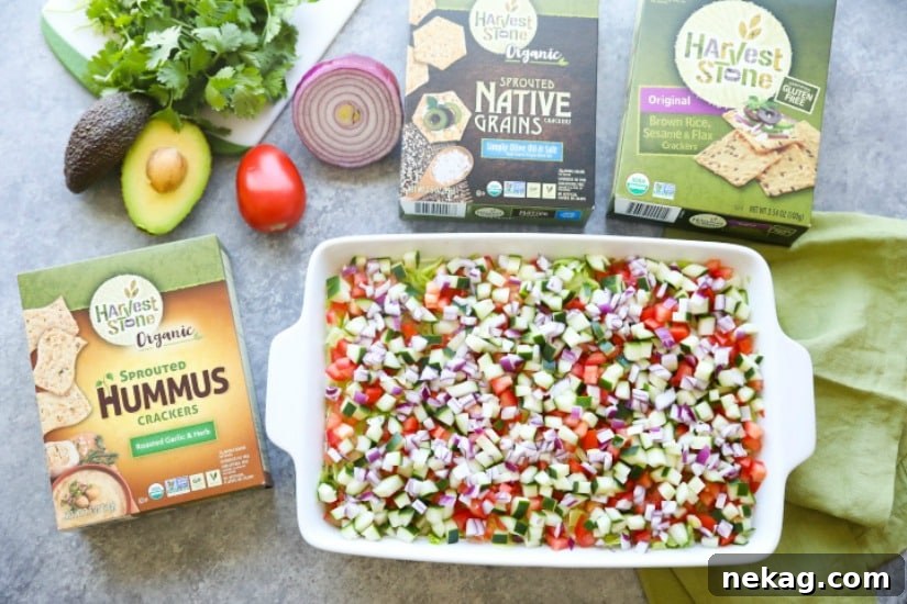 Lightened Seven-Layer Dip Recipe for Parties and Game Day 5 This Skinny Seven Layer Dip is loaded with fresh veggies, and makes a great appetizer or snack for any party or barbecue!