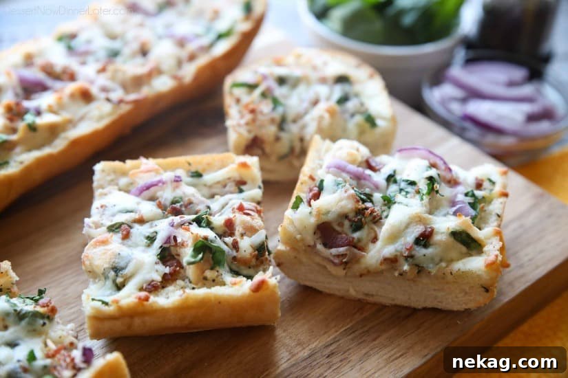 Chicken Alfredo Garlic Bread Pizza is a quick and easy dinner with loads of flavor! Pick up a loaf of French bread and make this tonight!