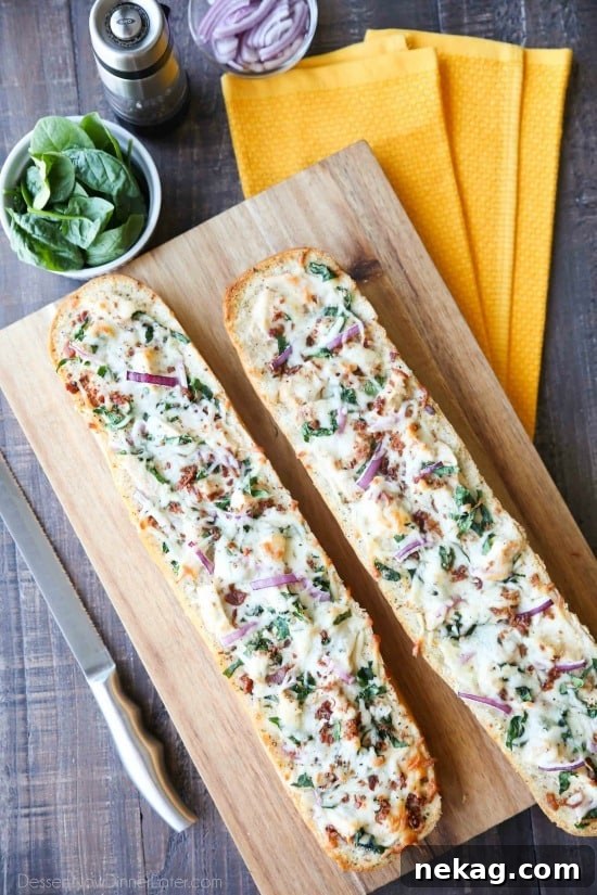 Chicken Alfredo Garlic Bread Pizza is a quick and easy dinner with loads of flavor! Pick up a loaf of French bread and make this tonight!