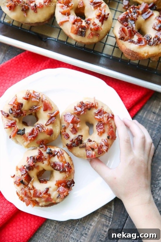 Maple-Bacon Donuts: Sweet Maple Glaze with Crispy Bacon 3 Maple Bacon Donuts are breakfast perfection! The salty bacon cuts through the sweetness of the maple and brown sugar glaze on top of a fluffy yeast donut.