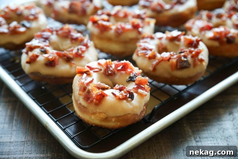 Maple-Bacon Donuts: Sweet Maple Glaze with Crispy Bacon 6 Maple Bacon Donuts are breakfast perfection! The salty bacon cuts through the sweetness of the maple and brown sugar glaze on top of a fluffy yeast donut.