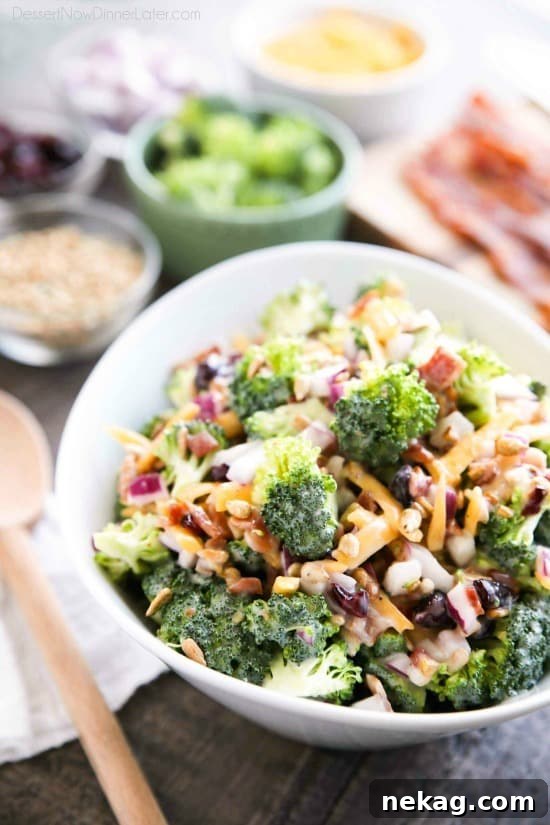 This Broccoli Salad recipe is our favorite! It's creamy, sweet, and salty, with the just the right amount of crunch. A great side dish for barbecues, potlucks, picnics or parties. Everyone loves this salad!