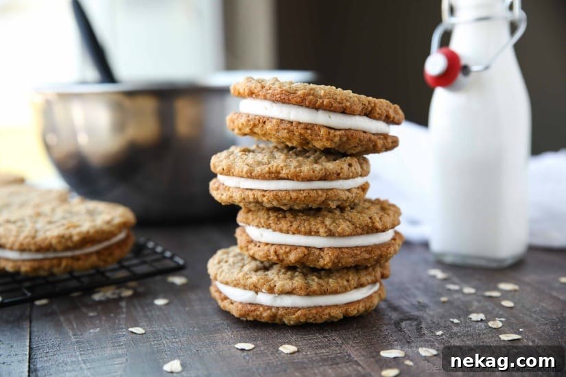 Oatmeal Cream Pies - Soft and chewy oatmeal cookies filled with vanilla buttercream frosting.