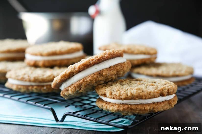 Oatmeal Cream Pies - Soft and chewy oatmeal cookies filled with vanilla buttercream frosting.