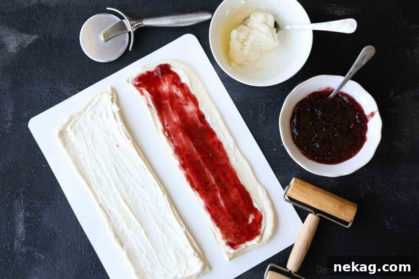 Halloween Intestines Bread Recipe — Creepy Savory Loaf Tutorial 5 Intestines Bread is a fun halloween party food that makes you look twice. All it really is, is a sweet pull apart bread with cream cheese and raspberries.