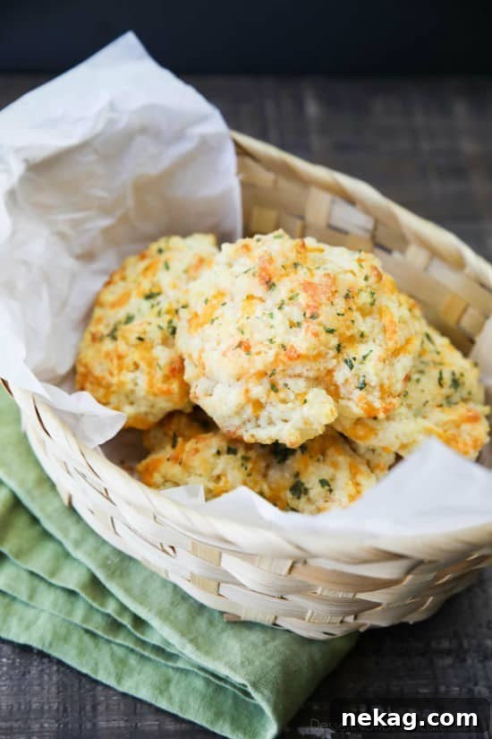 Copycat Red Lobster Cheddar Bay Biscuits with crisp edges and a fluffy center.