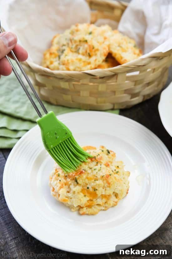 Cheddar Bay Biscuits are cheesy with a tender center and buttery garlic topping.