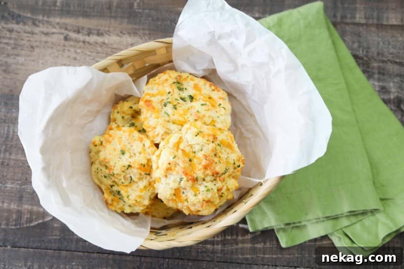 Freshly baked Cheddar Bay Biscuits brushed with garlic butter.