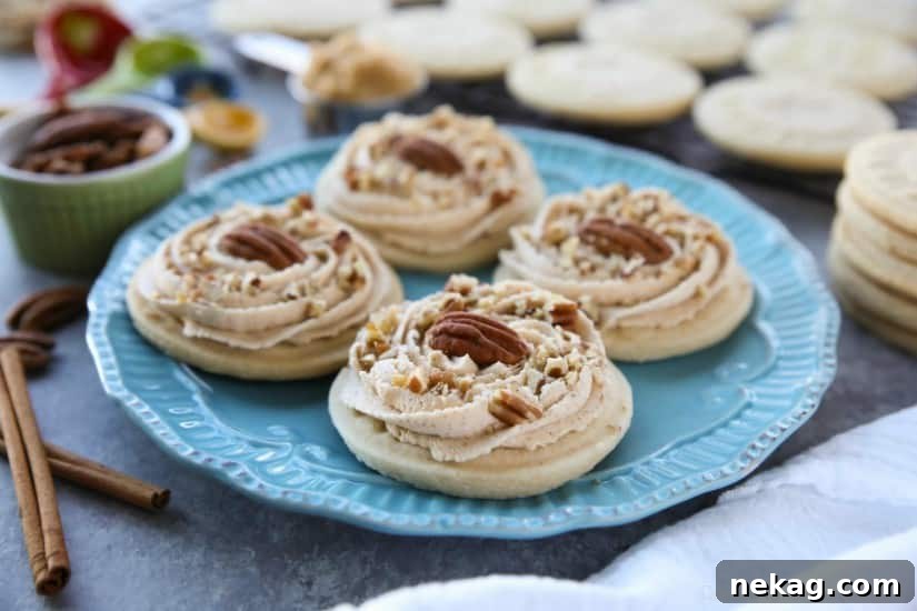 Brown Sugar Pecan Sugar Cookies are made with a classic sugar cookie base and topped with a brown sugar frosting and crunchy toasted pecans.