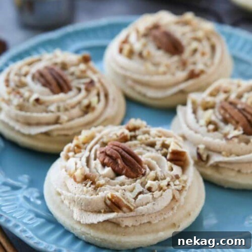 Brown Sugar Pecan Sugar Cookies are made with a classic sugar cookie base and topped with a brown sugar frosting and crunchy toasted pecans.