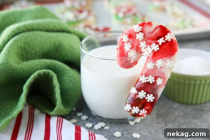 Swirled Christmas Sugar Cookies make cookie decorating easy! Simply swirl food coloring in a special glaze and dip the cookie!