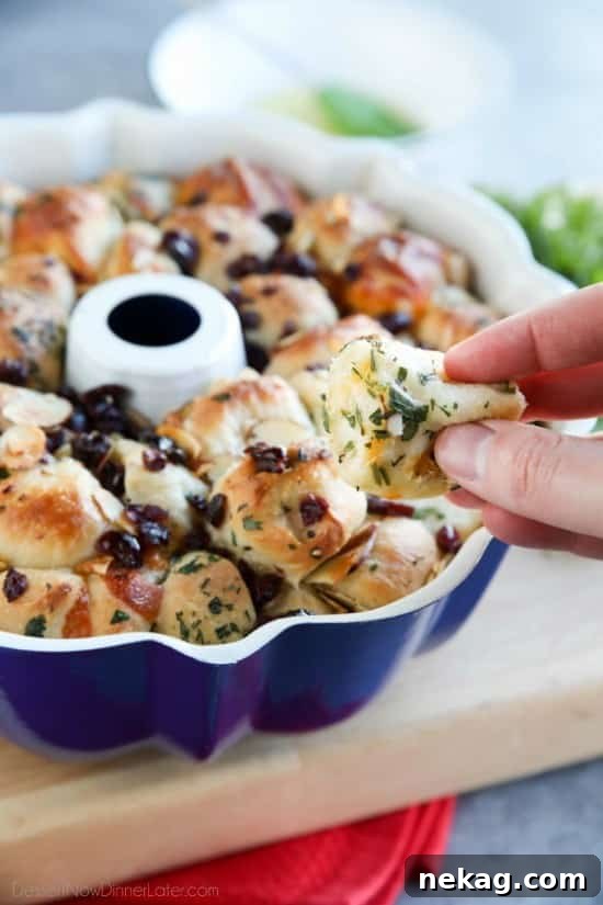 Savory Monkey Bread makes a great appetizer to share. Eat it as-is, or dip it in oil and vinegar. It's a delicious savory side to your dinner!
