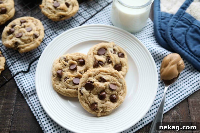 Chewy Peanut Butter Chocolate Chip Cookies Recipe 4 These totally irresistible Peanut Butter Chocolate Chip Cookies are chewy yet tender, and super easy to make!