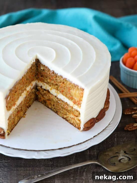 This easy carrot cake recipe is moist, perfectly-spiced, and topped with the BEST cream cheese frosting. Customize it with your favorite fillers or enjoy it simply as-is.