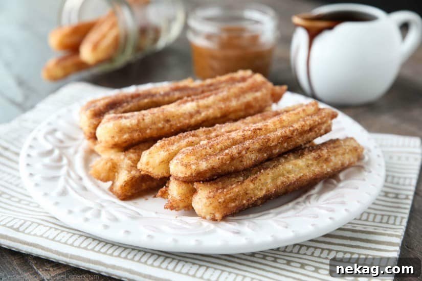 This churros recipe is super easy to make with a simple churro dough that is piped into oil and fried, then coated in cinnamon-sugar. You can enjoy these crisp, yet soft homemade churros anytime!