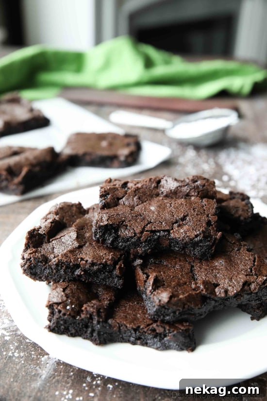 Ultra-Fudgy Chocolate Brownies with Crackly Top 4 Homemade fudgy brownies are cheap and easy to make in one bowl like you would with a boxed mix from the store! Super moist and fudgy, these brownies will get eaten fast!
