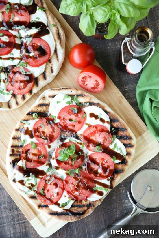 Grilled Caprese Flatbread with Fresh Mozzarella and Basil 2 Grilled Caprese Flatbread topped with mozzarella, tomatoes, basil, and balsamic glaze