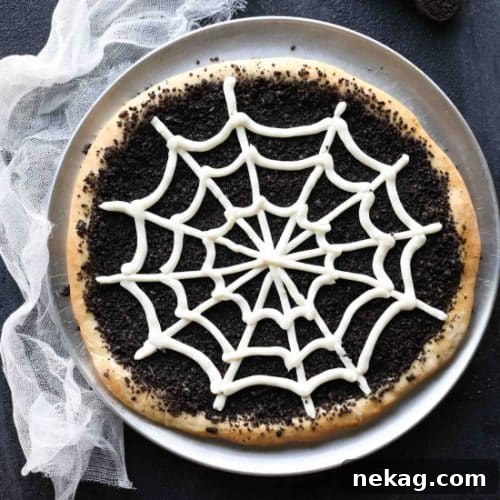 This Cobweb Oreo Dessert Pizza is an easy and fun Halloween party food that will be enjoyed by guests of all ages.