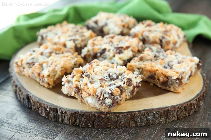 Chewy Seven-Layer Bars Recipe with Step-by-Step Video 4 Tray of baked Seven Layer Bars cooling before cutting.