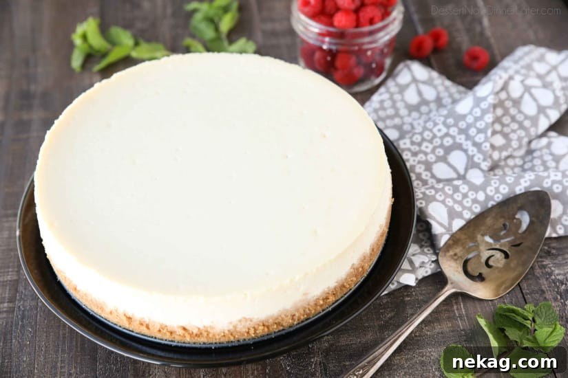 Classic New York Cheesecake Recipe with Creamy Silky Filling 4 Sliced classic cheesecake